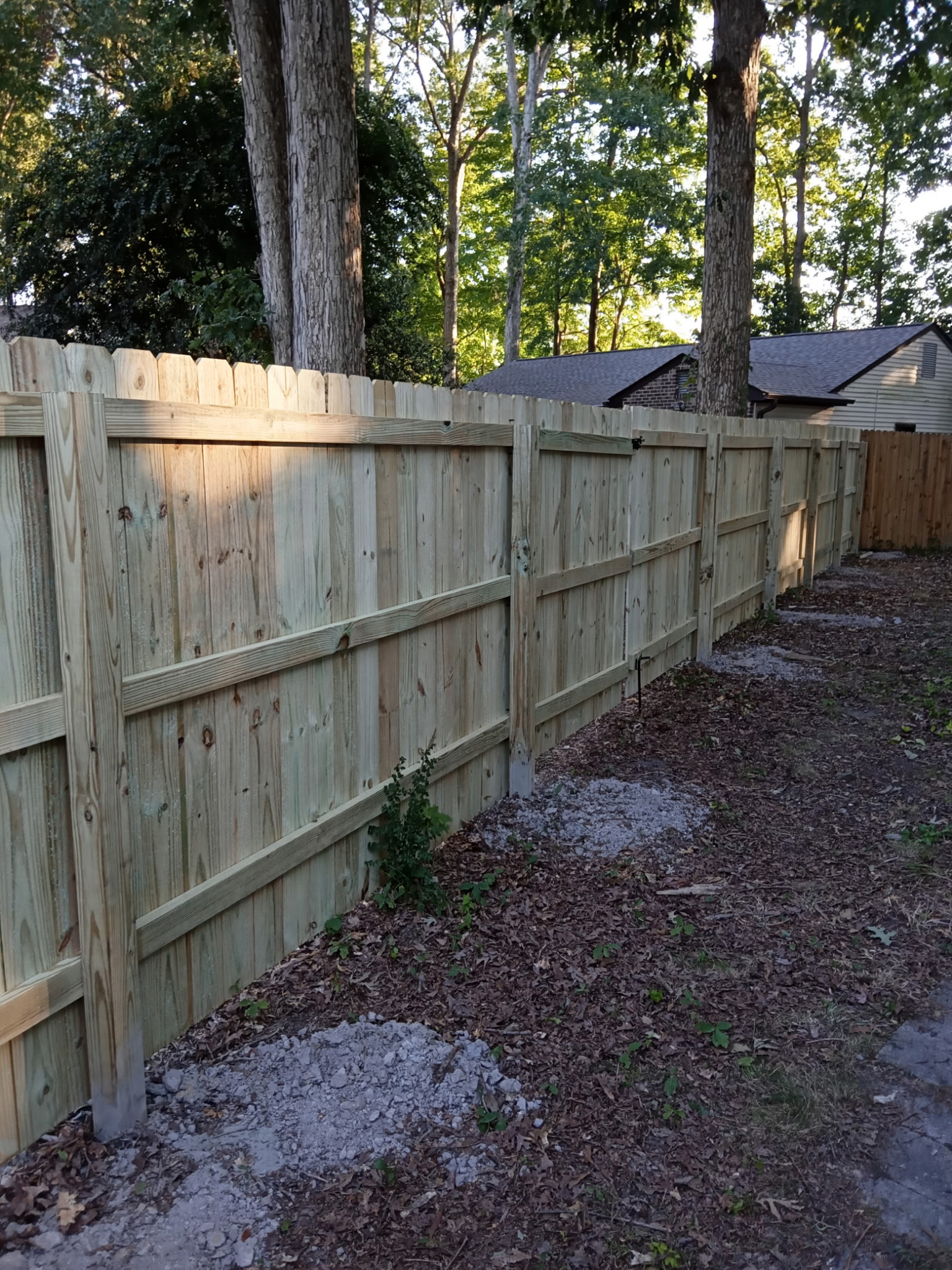 Completed wood privacy fence by Royalty